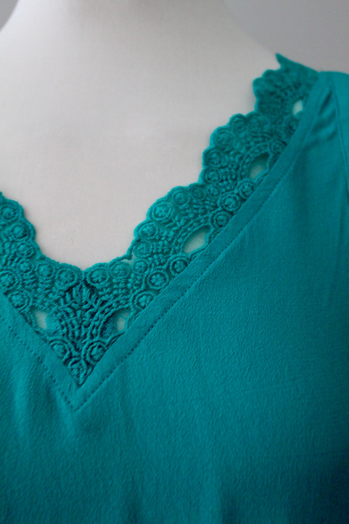 Bright Winter seasonal tone tank top sleeveless blouse in teal green with lace Skies are Blue for Stitch Fix Kristie