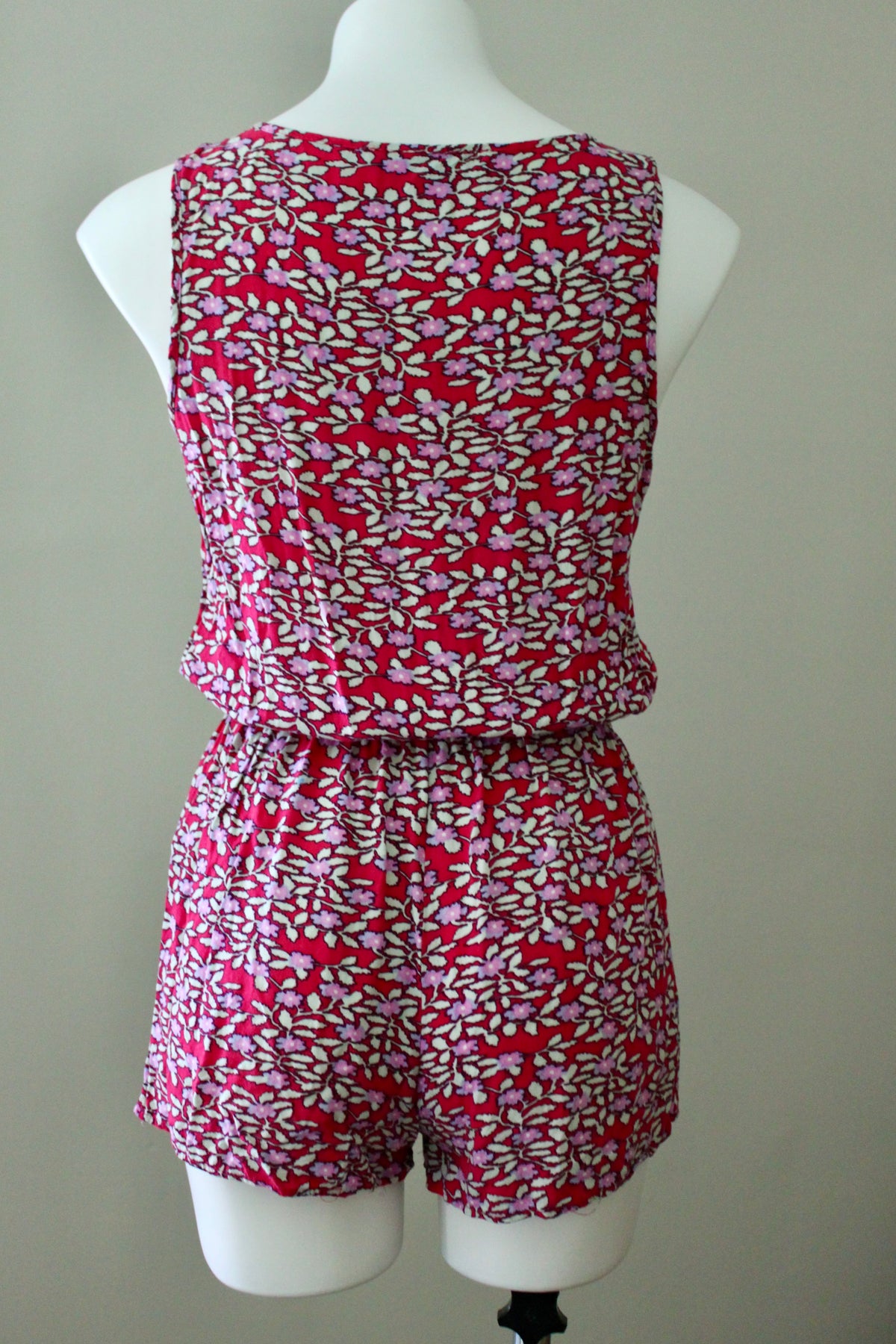 FOREVER21 ﻿Cool Winter romper in a delicate raspberry, lavender, and pink floral print