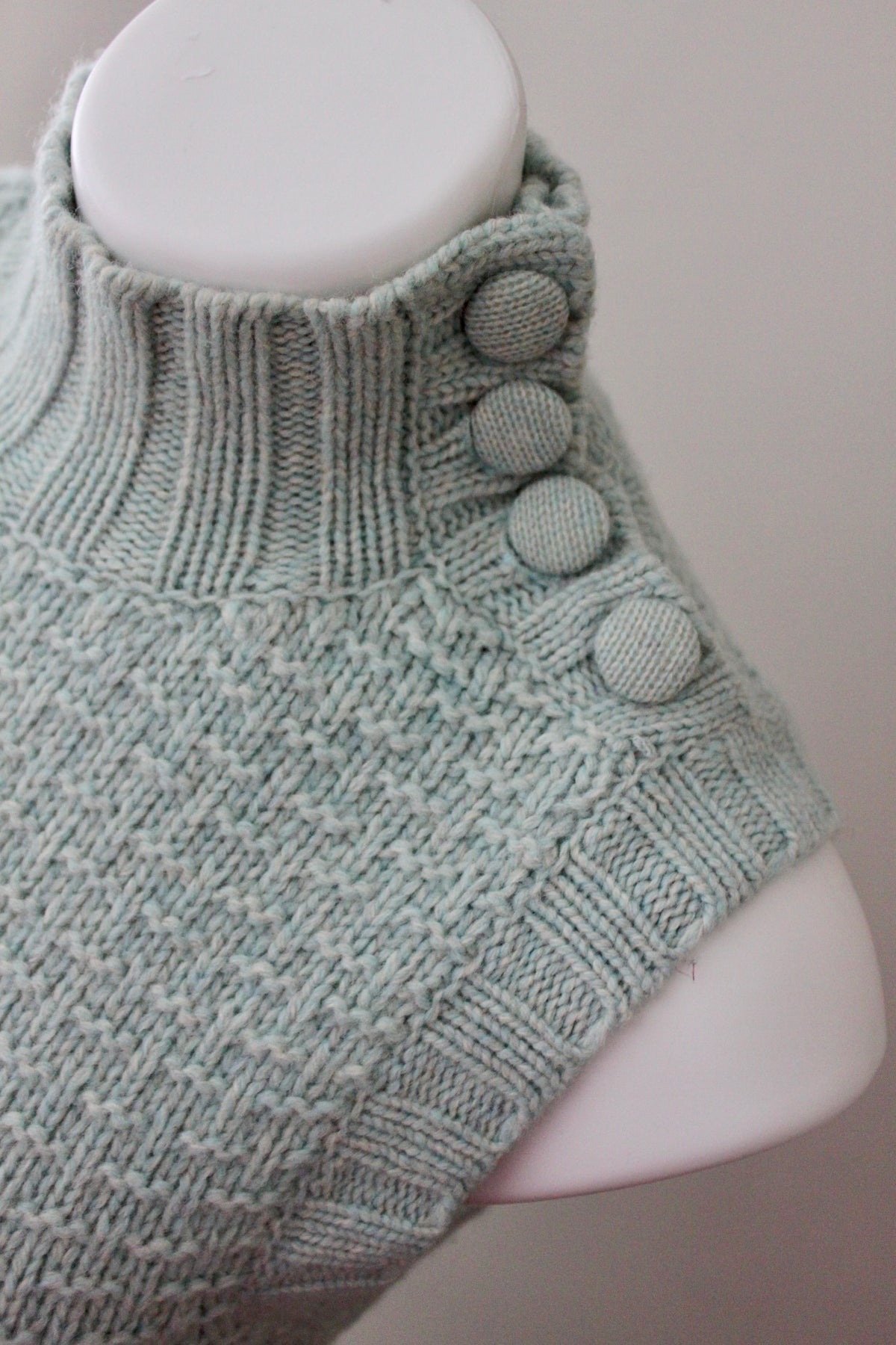 EMS button Soft Summer sleeveless dusty sage turtleneck sweaterdetail